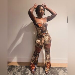 This is a piece of ART! Mesh Jumpsuit, Size L. Worn Once.